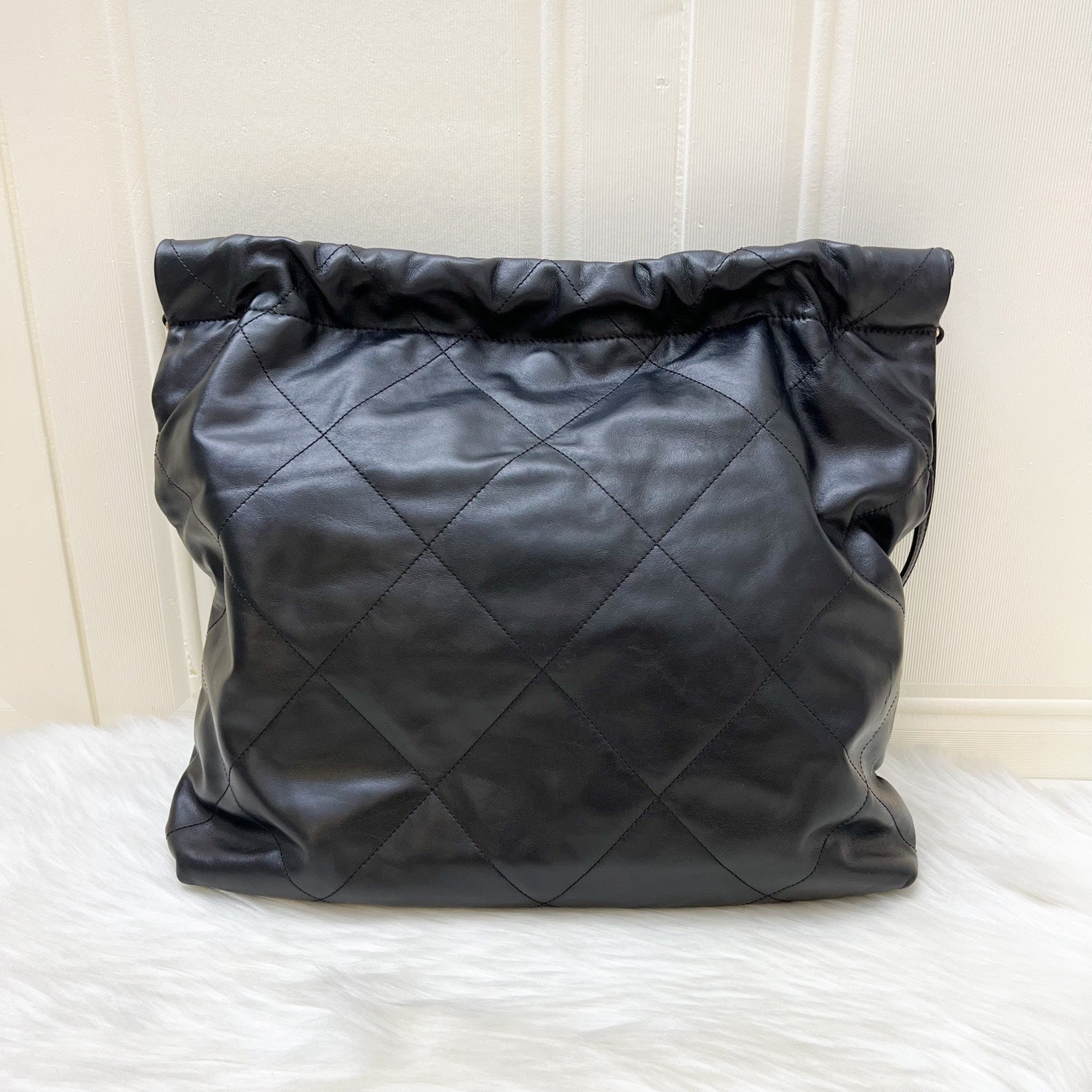 Chanel 22 Medium Hobo Handbag In Black Calfskin And AGHW